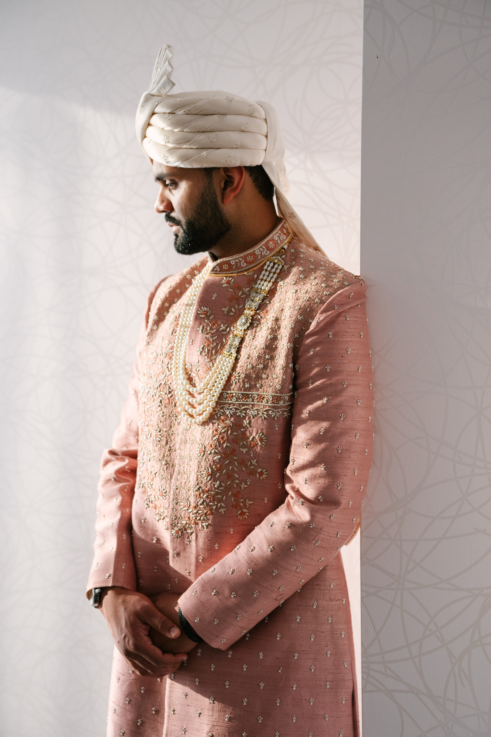 indian groom getting ready at white oaks resort & spa, niagara-on-the-lake, canada. 