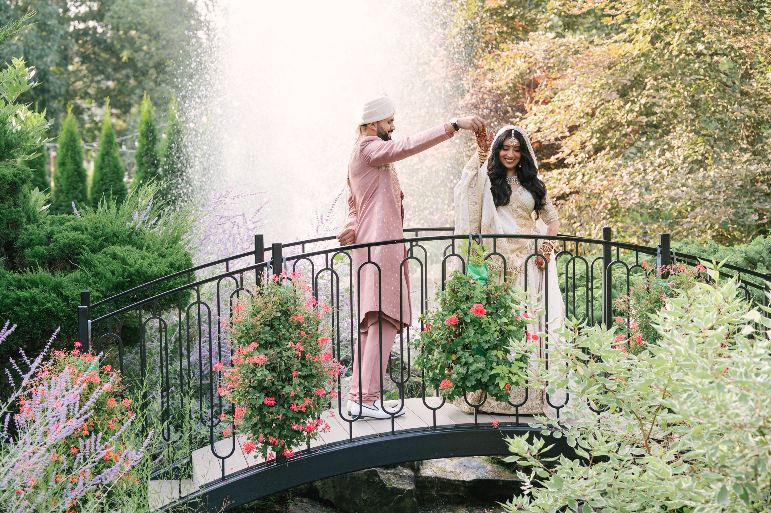 first look at an outdoor hindu wedding at white oaks resort & spa, niagara-on-the-lake, ontario.